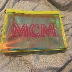 MCM Neon Holographic clutch.used twice while at a festival. GUC